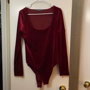 Never worn! Red velvet long sleeve bodysuit